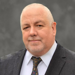 headshot of Eugene Enix