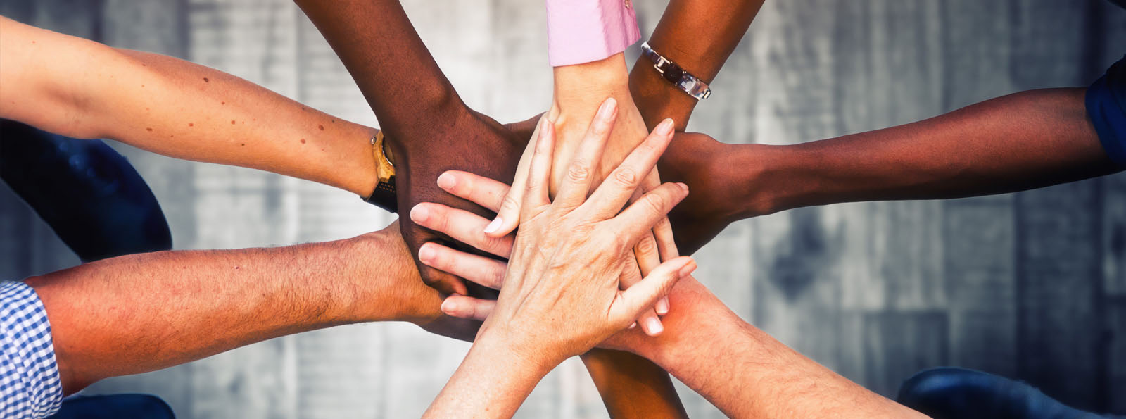 hand stack including people of differing races and ethnicities