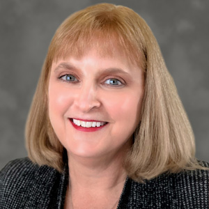headshot of Sheila Compton